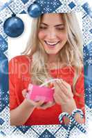 Composite image of blonde woman discovering necklace in a gift box