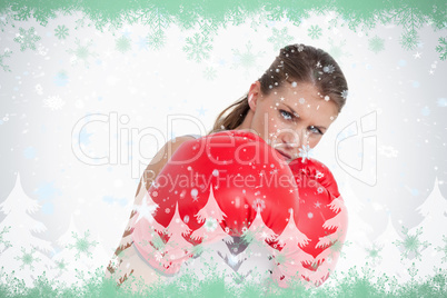 Composite image of sports woman boxing