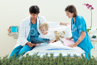 Attractive doctor showing an xray to his patient