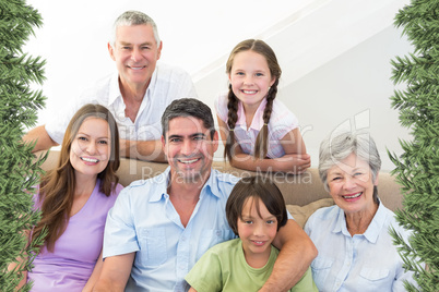 Composite image of smiling multigeneration family