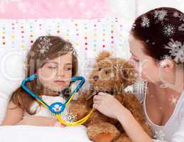 Composite image of sick daughter playing with a stethoscope with