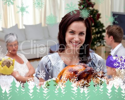 Woman showing christmas turkey for family dinner