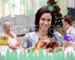 Woman showing christmas turkey for family dinner