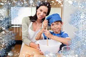 Composite image of mother and son having fun preparing dough