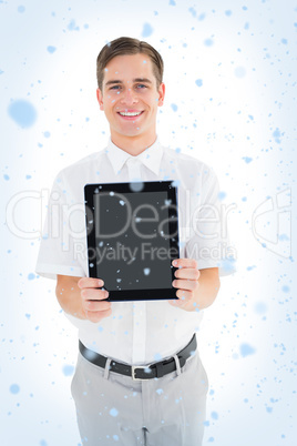 Geeky businessman showing his tablet pc