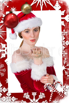 Pretty girl in santa costume holding hand out