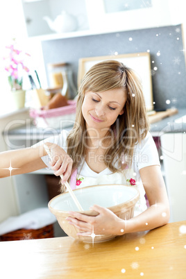 Portrait of a teen woman preparing a cake in the kitchen