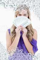 Composite image of blonde woman hiding her face behind a fan of