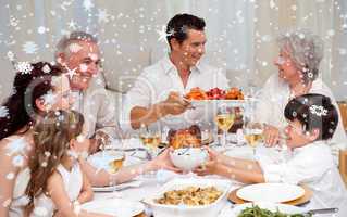 Composite image of family having a big dinner at home