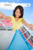 Woman showing her shopping bags under address bar