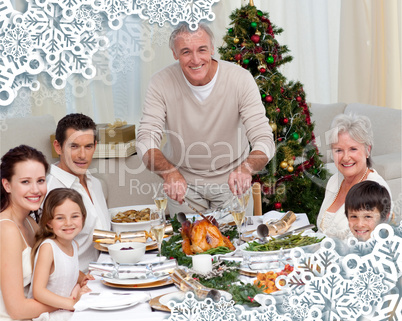 Grandfather cutting turkey for christmas dinner