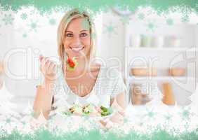 Close up of a gorgeous woman eating salad