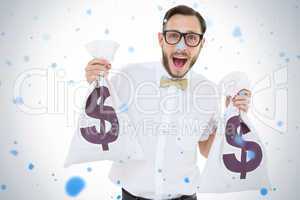 Geeky businessman holding money bags