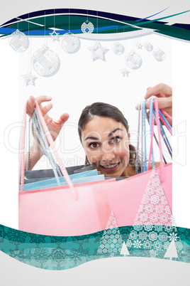 Composite image of portrait of a cheerful woman showing shopping