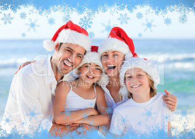 Family during christmas day at the beach