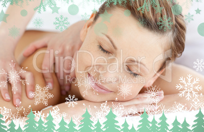 Charming woman enjoying a back massage