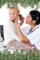 Composite image of cute little girl attending a medical checkup