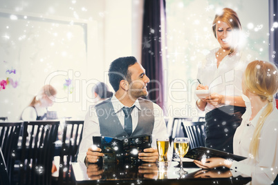 Composite image of business people ordering dinner