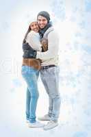 Attractive young couple in warm clothes hugging