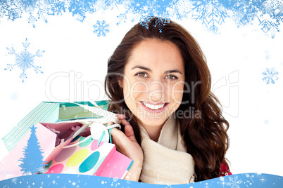 Radiant woman wearing a scarf and holding shopping bags