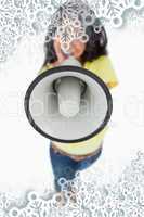Close up of a megaphone holding by a young woman