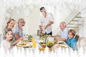 Composite image of smiling father serving meal to family