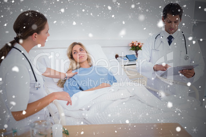 Composite image of doctor taking care of a patient