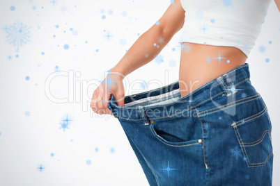 Woman wearing too large pants