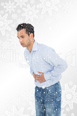 Casual young man with stomach pain