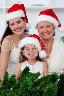 Daughter mother and grandmother baking christmas sweets