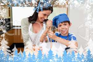 Composite image of mother and son having fun preparing a cake