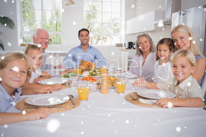 Composite image of family celebrating thanksgiving