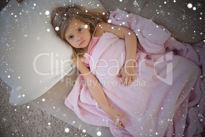 Composite image of high angle portrait of cute girl resting on s