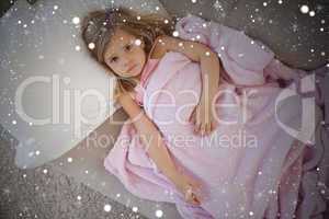 Composite image of high angle portrait of cute girl resting on s