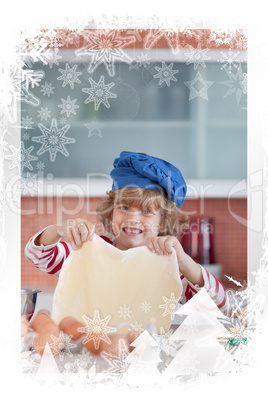 Young boy baking in a kitchen