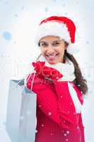 Beautiful festive woman holding shopping bag