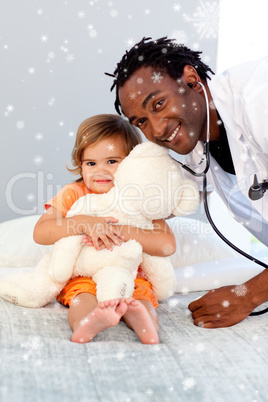 Caring young doctor with cute girl