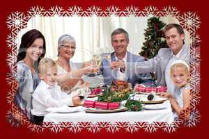 Family tusting in a christmas dinner
