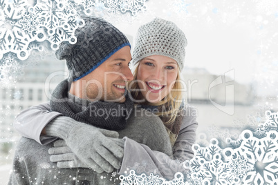 Cute couple in warm clothing hugging woman smiling at camera