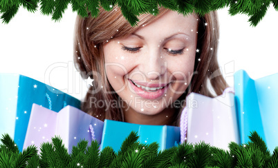 Composite image of beautiful woman with shopping bags