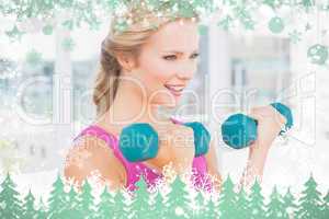 Composite image of happy blonde lifting dumbbells