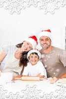 Happy family baking christmas cookies together