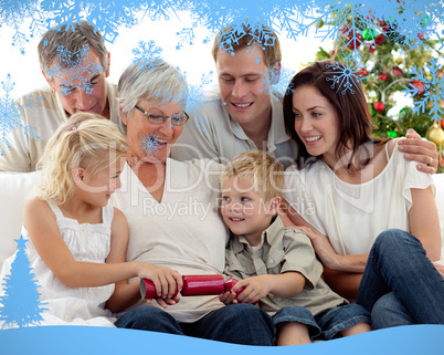 Composite image of brother and sister pulling crackers in christ