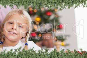 Cute girl smiling at christmas