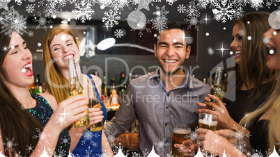 Composite image of chatting friends drinking beer