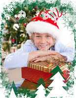 Composite image of happy little boy with christmas presents