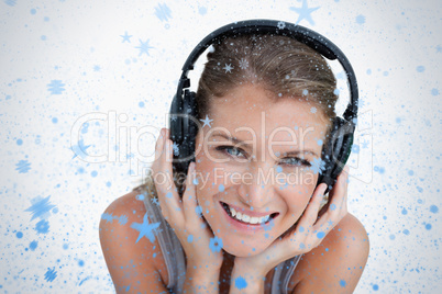 Close up of a happy woman listening to music