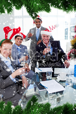 Composite image of manager and his team toasting with champagne