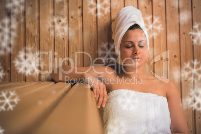 Calm woman relaxing in a sauna