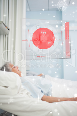 Patient lying in hospital bed with futuristic ecg data display